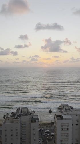 Aerial sunset captured over Bat Yam coastline