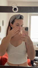 Woman records mirror selfie in Belgrade suburb