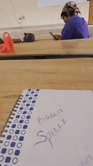 Handwritten notebook reading 'BIGGEST SPELLZ' in Bukuru, Nigeria