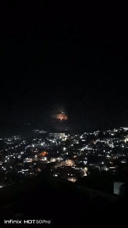 Caracas nights from above, plus a dog playing fetch indoors