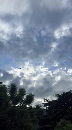 Three helicopters fly formation over Montenegro seaside town