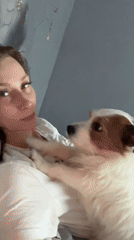 Lazy afternoon in bed with a small dog in Taldom