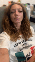 Woman photographed wearing cartel-themed shirt in Thailand office