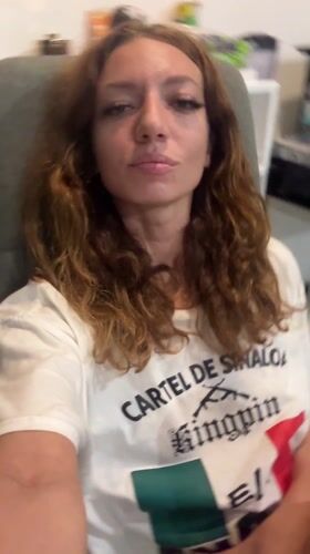 Woman photographed wearing cartel-themed shirt in Thailand office