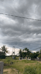 Domestic life documented amid overcast skies in Lhokseumawe, Indonesia