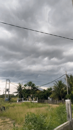 Domestic life documented amid overcast skies in Lhokseumawe, Indonesia