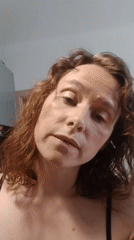 Woman records personal videos in Yekaterinburg kitchen