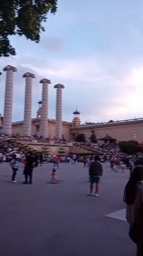 Crowds gather for evening Magic Fountain show in Barcelona