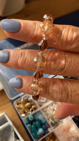 Bracelet making with beads and charms in Palmanova