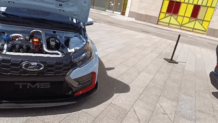 Exotic and custom cars gathered at a Moscow outdoor meet