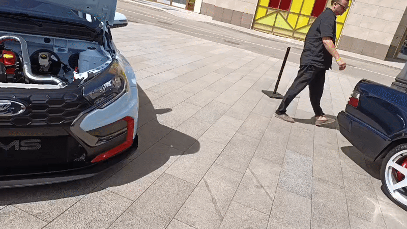 Exotic and custom cars gathered at a Moscow outdoor meet