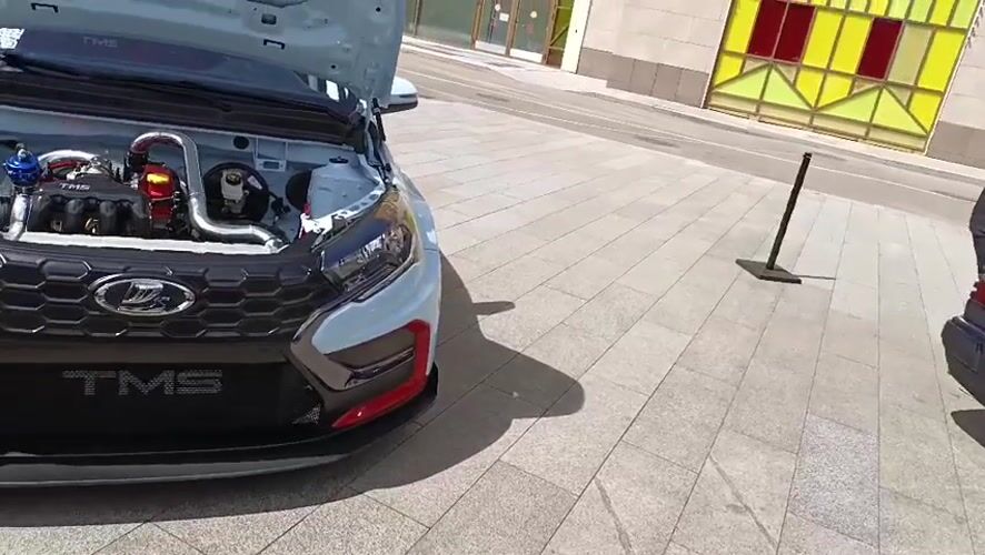Exotic and custom cars gathered at a Moscow outdoor meet