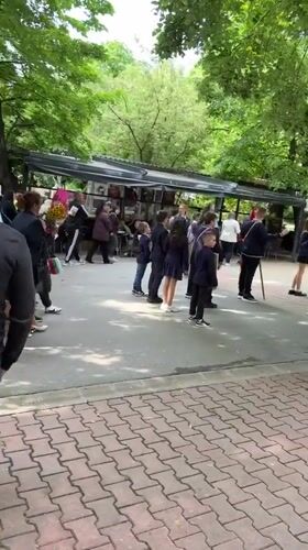 School children gather in formation with flag in Shumen park
