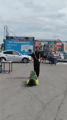Street jugglers perform outdoors in Chaikovsky, Russia