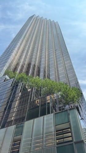 Fifth Avenue scene outside Trump Tower on a summer afternoon