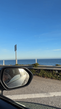 Malibu visitor documents coastal drive, environmental conservation signage