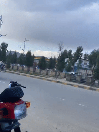 Man on red motorcycle observed in Kandahar street