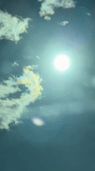 Witness documents rural spring journey with iridescent clouds