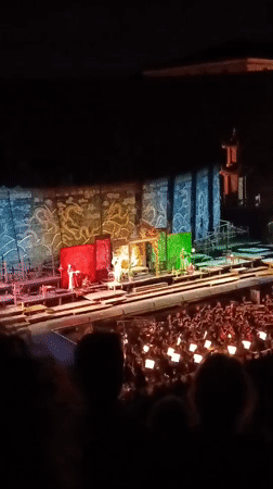 Ornate outdoor stage performance in Verona, evening show