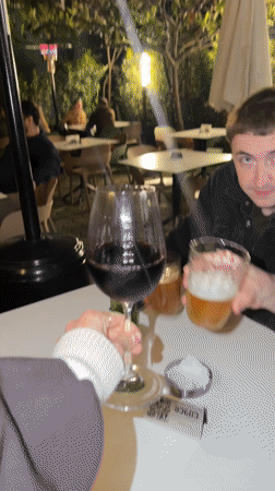 Couple takes playful selfie in modern Batumi building