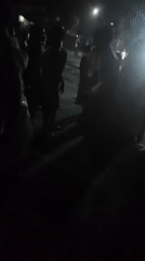 Nighttime gathering captured in Kiengu ward, Kenya