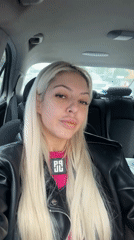 Woman films selfie video in car in Plovdiv