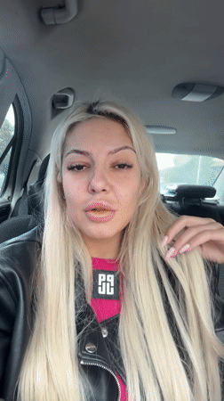 Woman films selfie video in car in Plovdiv