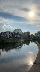 Strolling Yekaterinburg's riverside arena district on a summer afternoon
