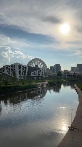 Strolling Yekaterinburg's riverside arena district on a summer afternoon