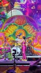 Outdoor concert night in Rivas-Vaciamadrid, colorful stage and lively crowd