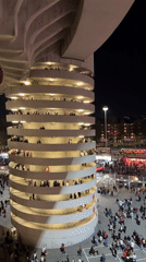 Nighttime crowds gather at Milan stadium venue