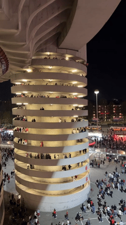 Nighttime crowds gather at Milan stadium venue