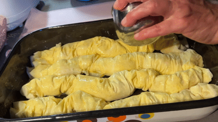 Traditional phyllo pastry preparation documented in Bulgarian village kitchen