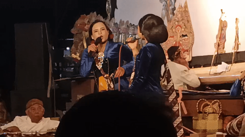 Gamelan concert with vocalists in blue, Tanahbaya, Indonesia