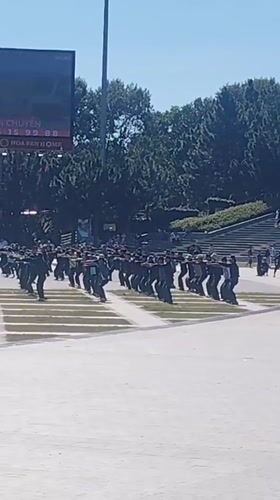 Mass public gathering with drills, exercises, and ceremony in Da Lat