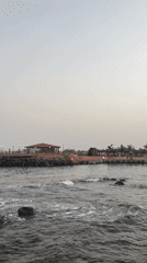 Early morning fishing activity captured on weathered Jeddah pier