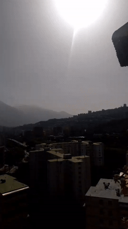 Caracas cityscape captured through hazy midday sun