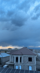 Armenian suburb shows mix of old Soviet blocks, new construction