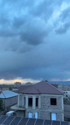 Armenian suburb shows mix of old Soviet blocks, new construction