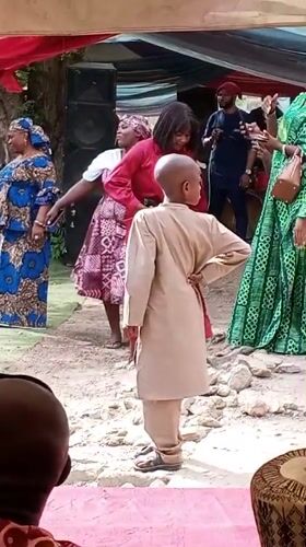 Outdoor celebration with traditional dress in Hotoro South, Nigeria