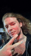 Man Records Nighttime Selfie Videos on North Kuta Street