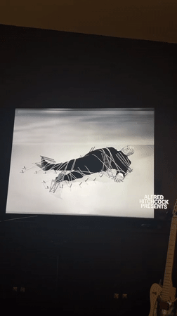 Alfred Hitchcock Presents title card observed on TV screen