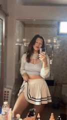 Mirror selfie session with outfit variations at a Thai residence