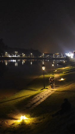 Street musicians perform at Xuan Huong Lake, Da Lat