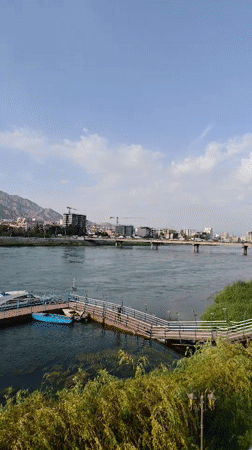 Wedding hall prep and city views along the Syr Darya in Khujand