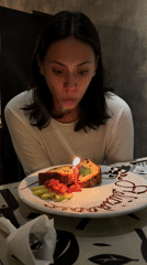 Birthday celebration documented at Mexican pizza restaurant