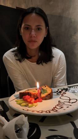 Birthday celebration documented at Mexican pizza restaurant