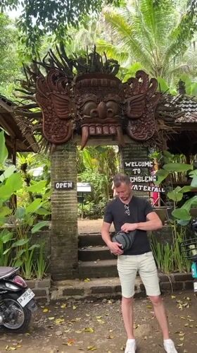 Tourists explore Bali's Sidemen region via scooter and waterfall visit