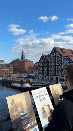 Afternoon street life and busking captured in Bydgoszcz, Poland