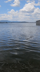 Submerged stone church rises from a Bulgarian reservoir